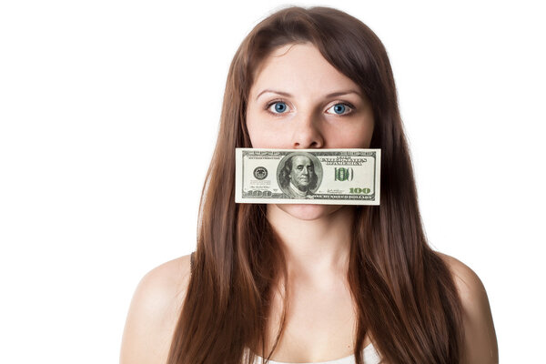 Young woman with 100 dollar bill on her lips