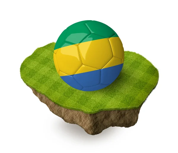 3d realistic soccer ball with the flag of Gabon on a piece of rock with stripped green soccer field on it. See whole set for other countries. — Zdjęcie stockowe