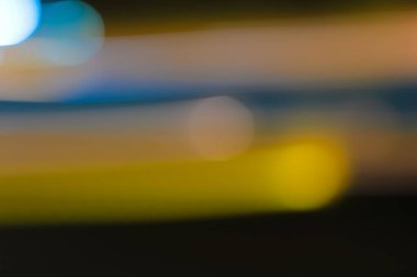 Yavaş deklanşör hızı Bokeh ile bulanık ışık çizgileri yakalamak, dinamik arkaplanlar ve sanatsal örtüler için renkli soyut tasarım