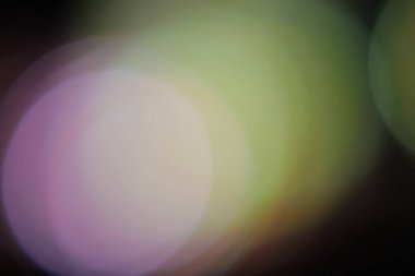 Dreamy Bokeh: Pastel Renkli Küreler Yumuşak Işık Oluşturuyor ve Zarif Arkaplan ve Sanatsal Tasarım İçin Bulanık Bir Efekt