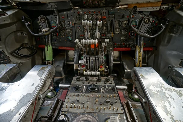 Vintage aircraft cockpit showing controls — ストック写真