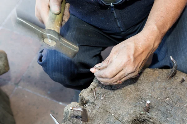 Hands of a coppersmith — Stock Photo, Image