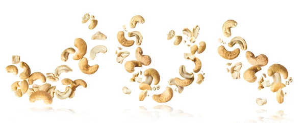 Set Fresh Tasty Cashew Nuts Falling Air Isolated White Background — Stock Photo, Image