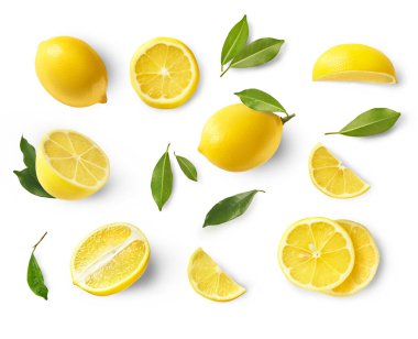 A creative set with Fresh ripe raw lemons with green leaves isolated on white background. Whole and cut yellow lemon collection, high resolution image clipart