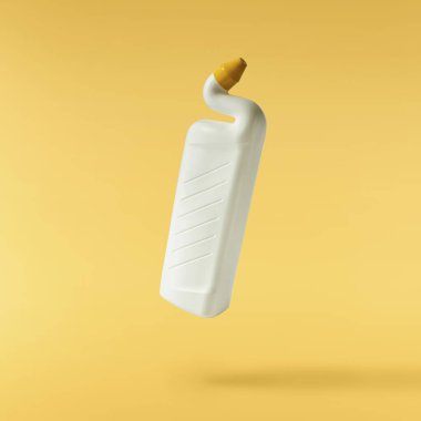 Household cleaning product. A plastic bottle falling in the air isolated on yellow background. Product mockup for your brand clipart