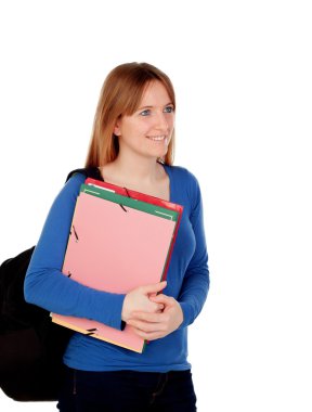 Genç kadın öğrenci sırt çantası ve klasörlerle