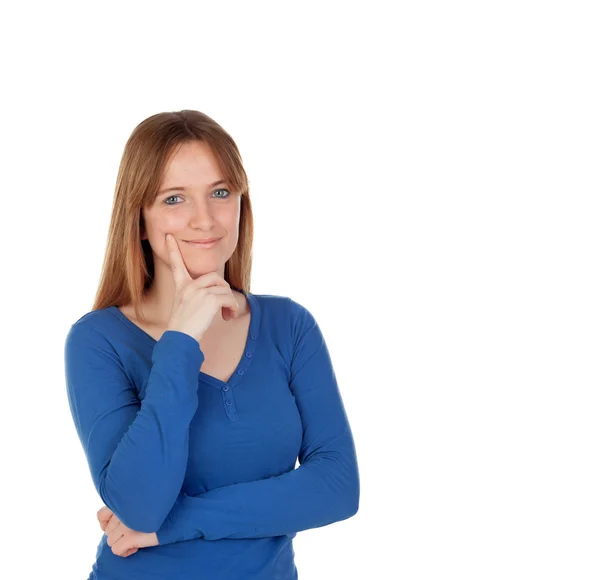 Nadenkend jonge vrouw in blauwe trui — Stockfoto