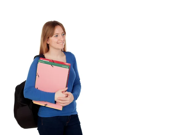 Молодая студентка с рюкзаком и папками — стоковое фото