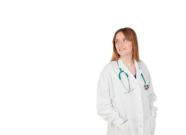 Žena doktor v bílém plášti s stetoskop — Stock fotografie