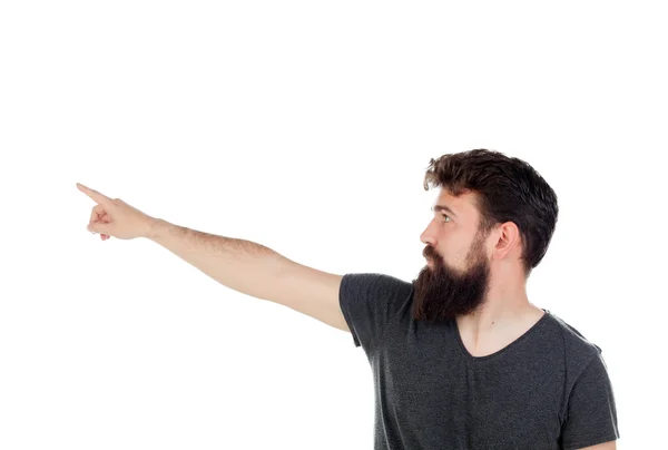 Handsome man indicating something with his finger — Stock Photo, Image