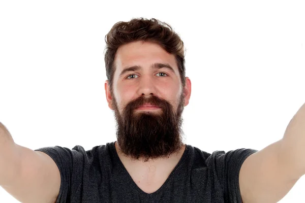 Мужчина с длинной бородой делает селфи — стоковое фото
