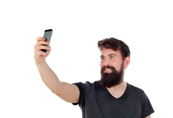 Schöner Mann macht Selfie mit Handy — Stockfoto