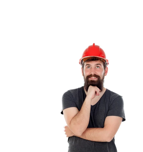 Uomo hipster pensieroso con casco rosso — Foto Stock