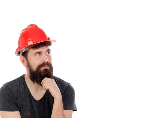 赤いヘルメットと物思いにふける流行に敏感な男 — ストック写真