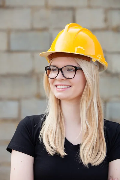 Young architect woman with yellow helmet — Stock Photo, Image