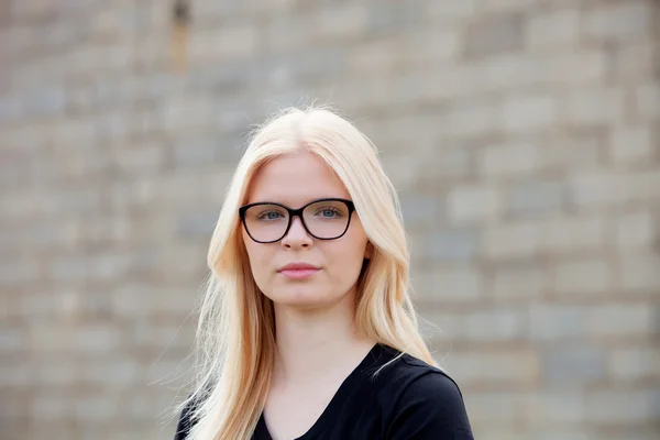 Beautiful young blonde girl with glasses — Stock Photo, Image