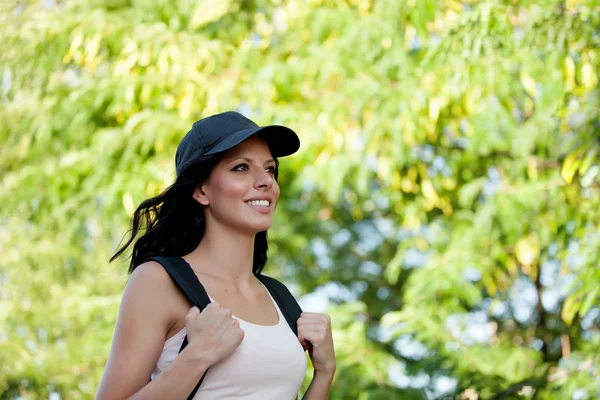 Beautiful brunette woman hiking — Stock Photo, Image