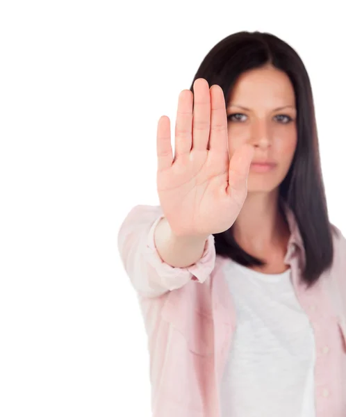 Young brunette girl making stop sign — Stock Photo, Image