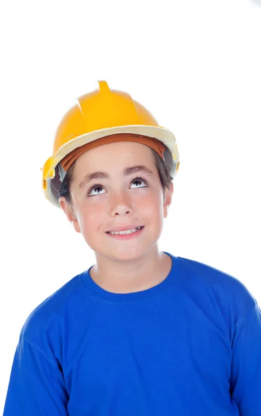 Lustiges Kind mit gelbem Helm. — Stockfoto