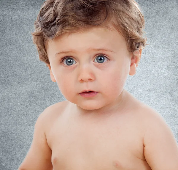 Baby one year old doing funny gestures — Stock Photo, Image