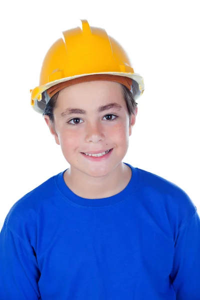 Criança engraçada com capacete amarelo . — Fotografia de Stock