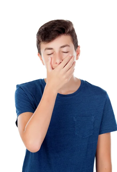 Tonåring kille som täcker munnen och med slutna ögon — Stockfoto