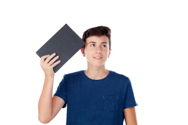 Tiener jongen met een boek — Stockfoto