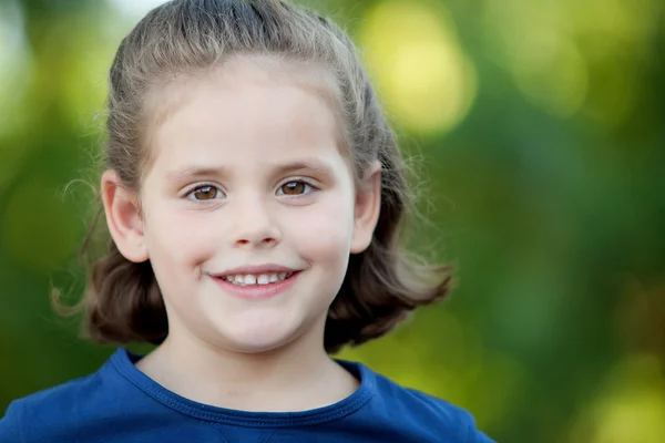 Cute little girl in the park — Stock Photo, Image