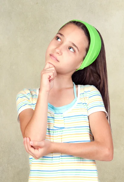 Pensive girl looking up — Stock Photo, Image