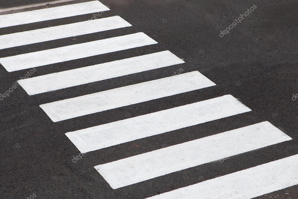 White stripes of a zebra crossing  