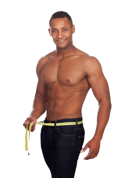 Strong man with tape measure — Stock Photo, Image