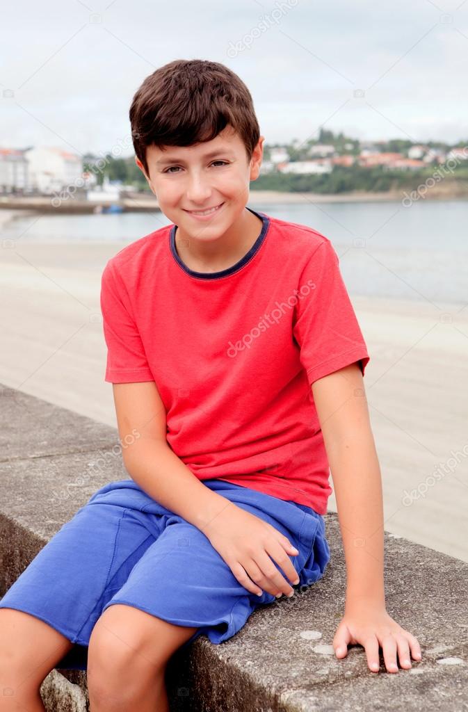 Smiling teenager on holiday at the coast 