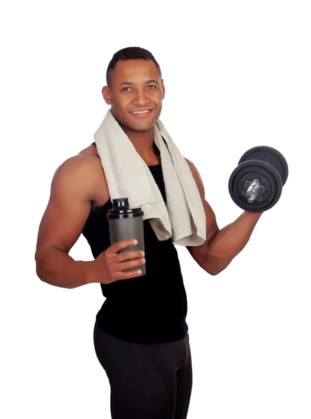 Homem latino-americano forte com halteres bebendo proteína depois — Fotografia de Stock