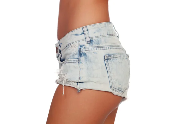 Mujer sexy cuerpo en pantalones cortos de jean — Foto de Stock