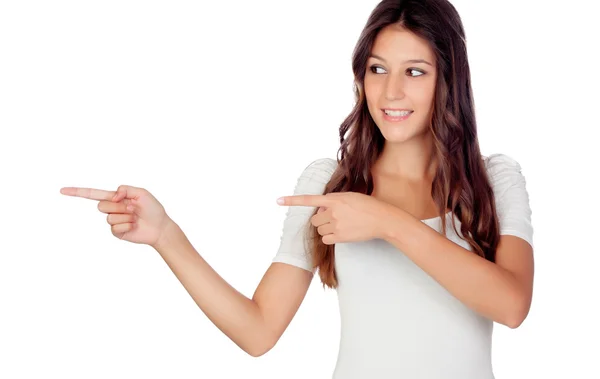 Attractive casual girl pointing at side something — Stock Photo, Image