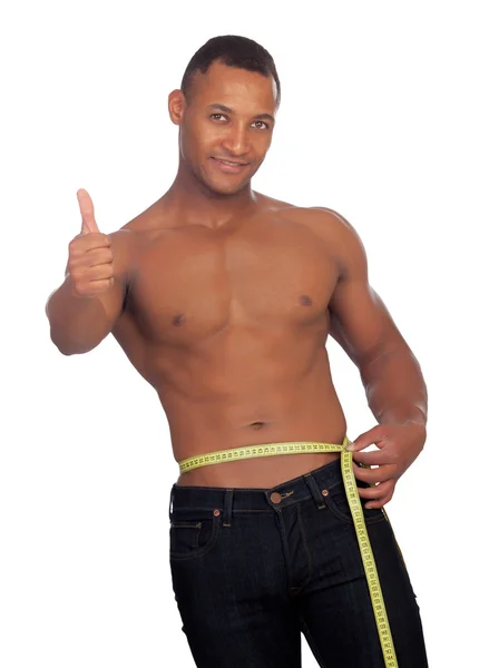 Strong man saying ok with a tape measure — Stock Photo, Image