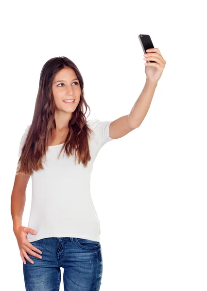 Attraktiva avslappnad tjej tar en bild med hennes mobil — Stockfoto