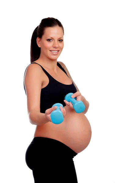 Morena embarazada entrenamiento con dimbbells —  Fotos de Stock