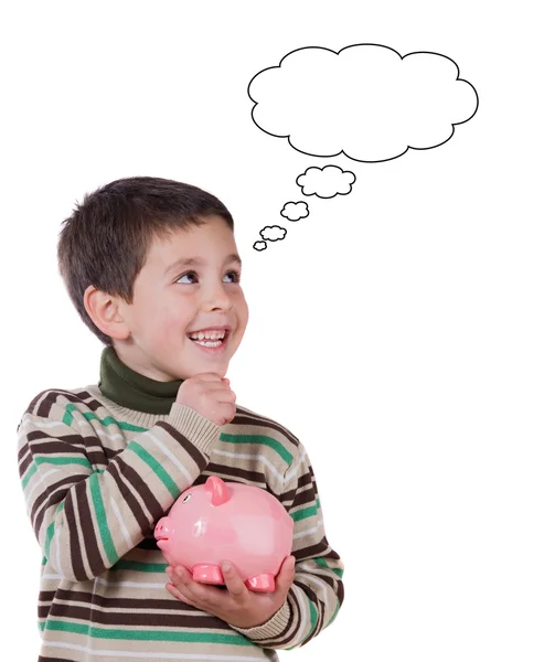 Bambino sorridente con un moneybox pensando — Foto Stock