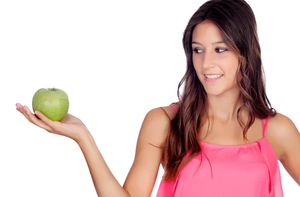 Casual meisje in roze met een groene appel — Stockfoto