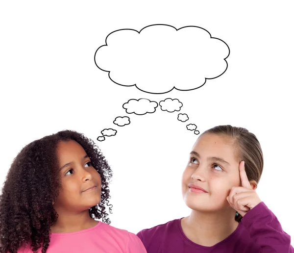 Two little girls thinking — Stock Photo, Image