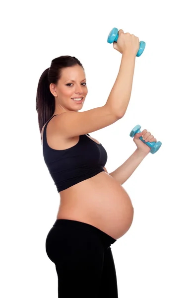 Bruneta těhotná žena trénink s činkami — Stock fotografie