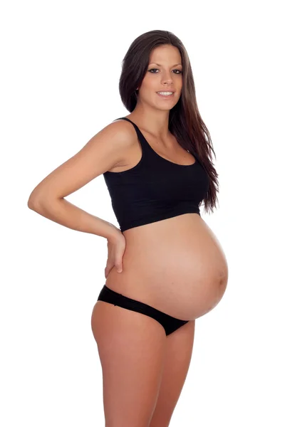 Belle brune enceinte en sous-vêtements avec ses mains dans la — Photo