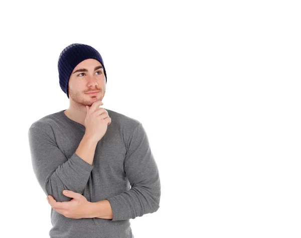 Pensive muscled man with wool hat — Stock Photo, Image