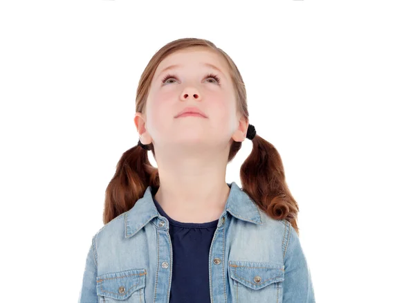 Girl with pigtails looking up — Stock Photo, Image