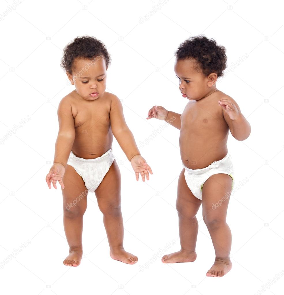 Identical babies twins in diapers