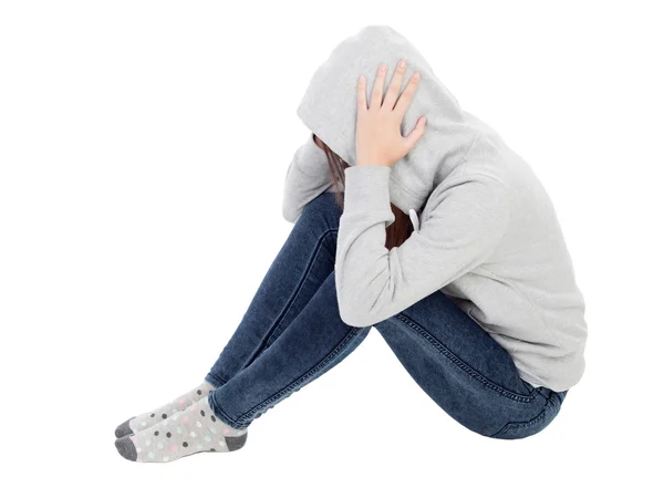 Sad teenager girl with gray sweatshirt hooded — Stock Photo, Image