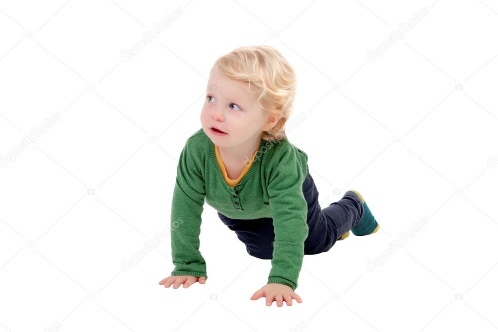 Adorable blond baby crawling