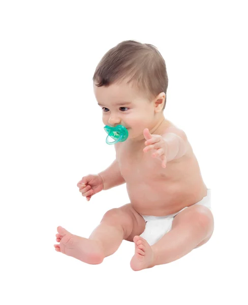 Adorable six month baby in diaper with pacifier — Stock Photo, Image