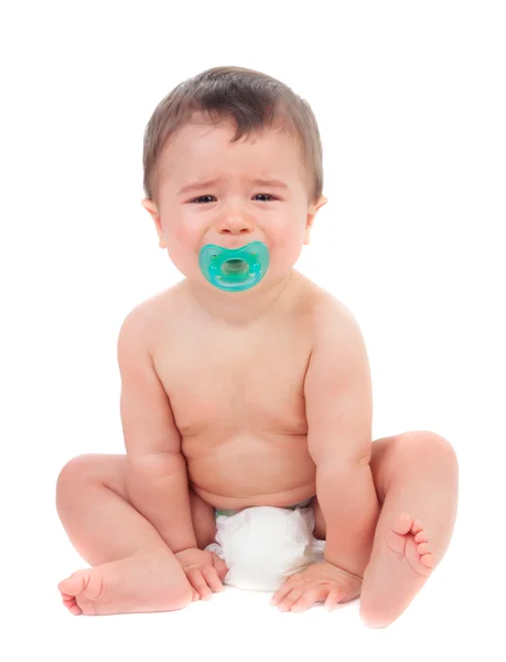 Bebê bonito chorando com chupeta — Fotografia de Stock